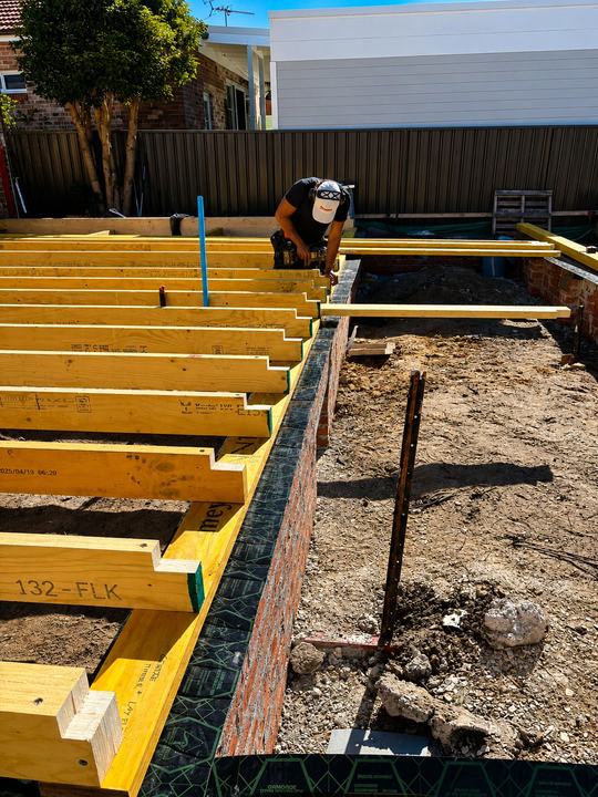 Termite barrier beneath a suspended timber floor