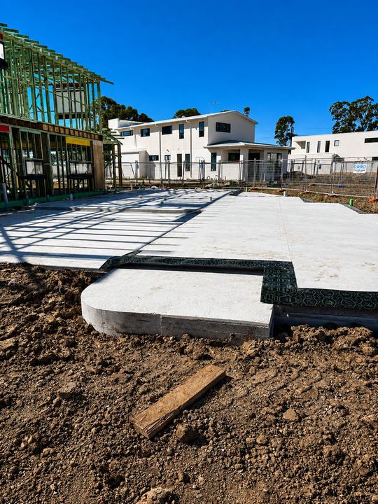 Perimeter barrier in place as framing begins