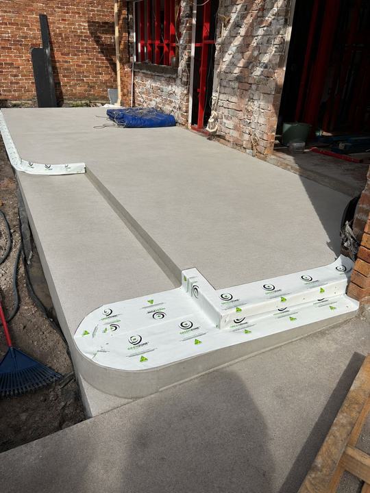 Protected slab edge with barrier collar in place