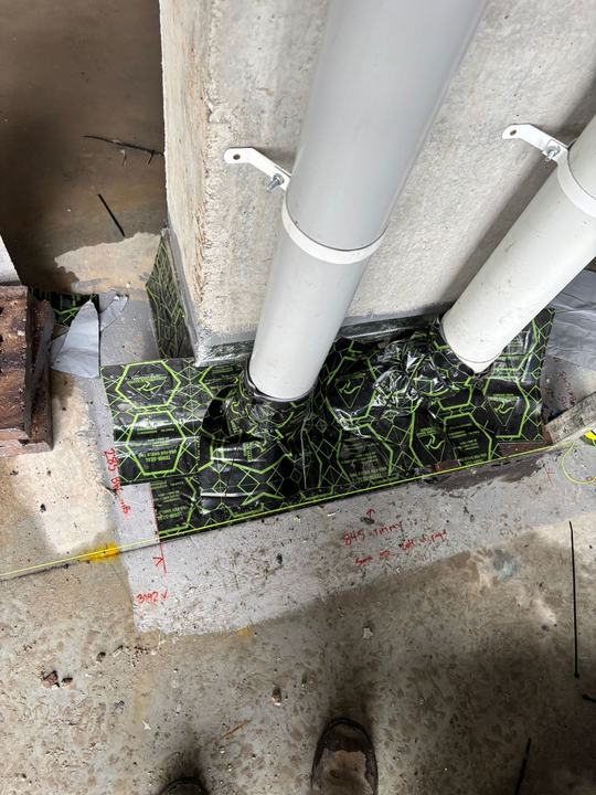 Pipe penetrations sealed into the termite barrier membrane