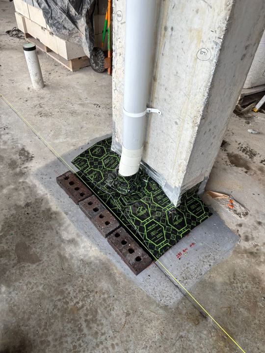 Barrier membrane sealed around a column penetration